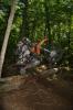 Jumping logs at the national enduro